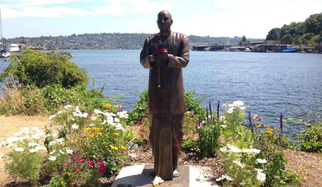 The Fremont Sri Chimnoy statue on a beautiful sunny Seattle day